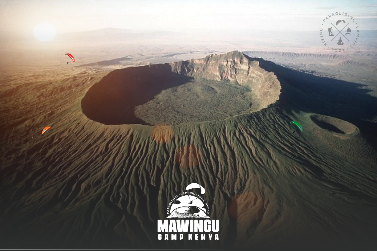 Aerial view of crater landscape with Mawingu Camp Kenya branding